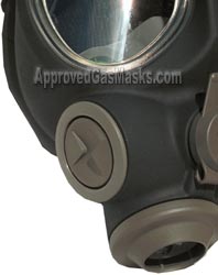 The M95 gas mask is shown here with it's standard plug which is replaced with this voice emitter